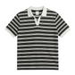 Black and white striped polo shirt on a white background